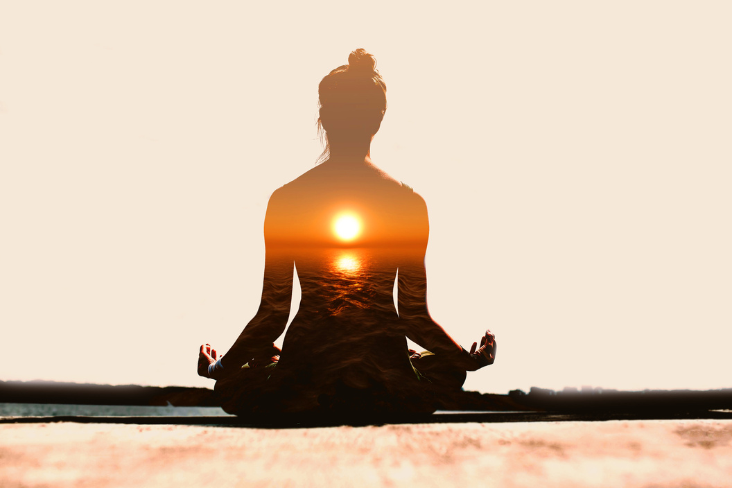 Yoga day concept. Multiple exposure image. Woman practicing yoga at sunset.